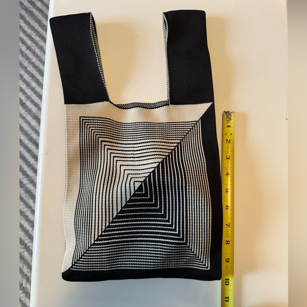 Small, unique women’s handbag. Very soft material, strap for shoulder